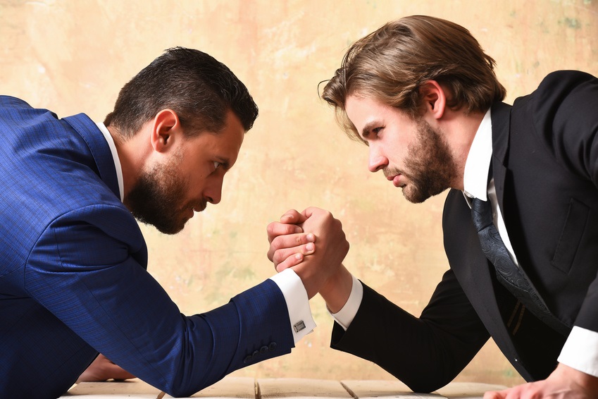 arm wrestling of businessman and compete man, co workers and dominance