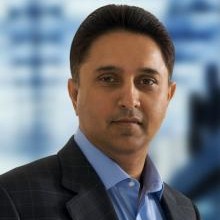 Kittu Kolluri, Chairman of OANDA