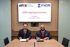 FXCM signs agreement
